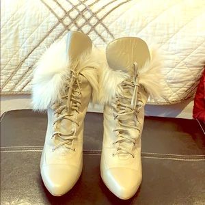 Leather fur boots I believe it’s rabbit fur.